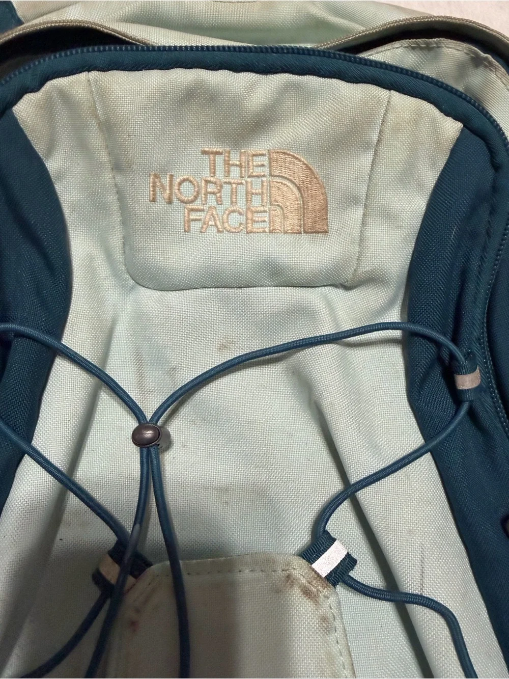 The North Face Jester Backpack in Light Mint and Navy Blue